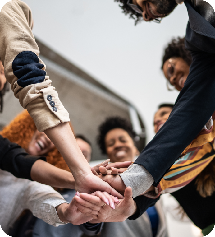 people stacking hands